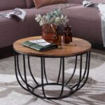 round coffee table Elegant round coffee table with wooden top and metal base